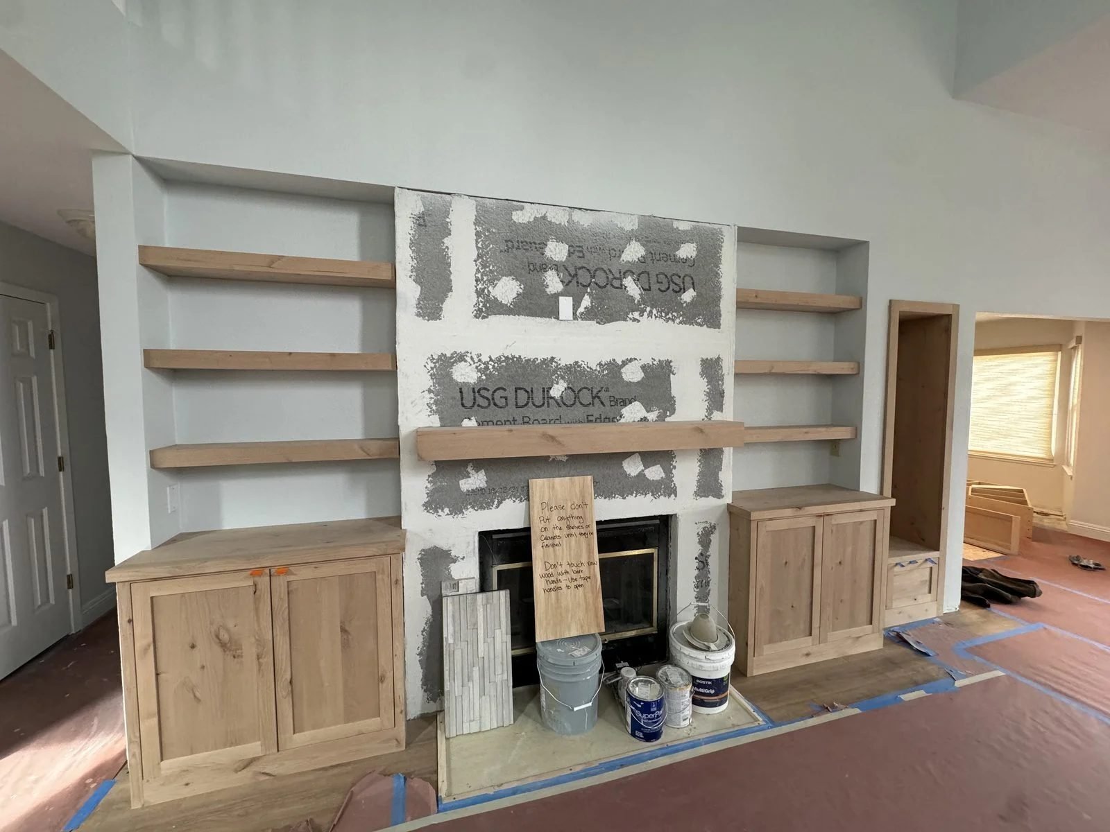 Fireplace wall built-in shelving during construction Reno NV