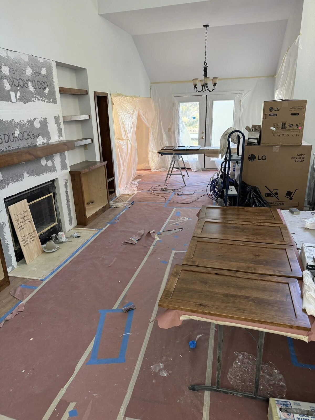 Custom fireplace built-ins during construction knotty alder Reno NV