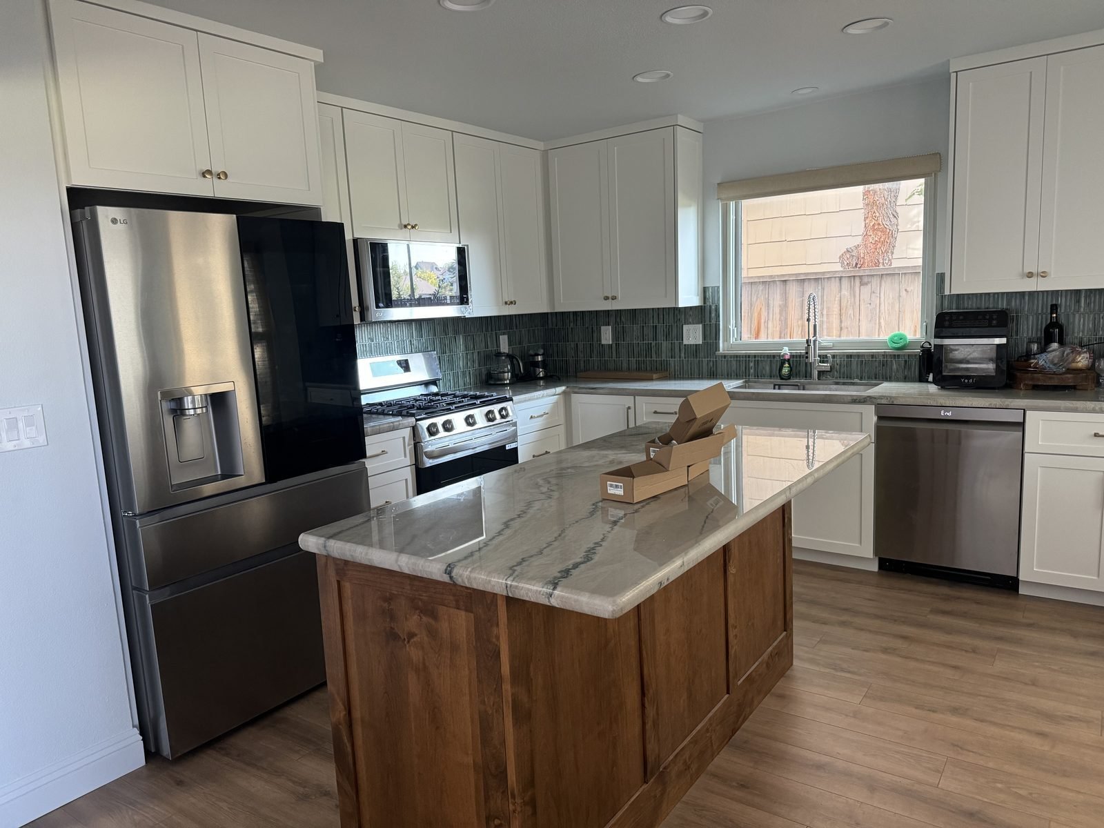 Custom kitchen remodel Reno NV with walnut island and quartzite countertops