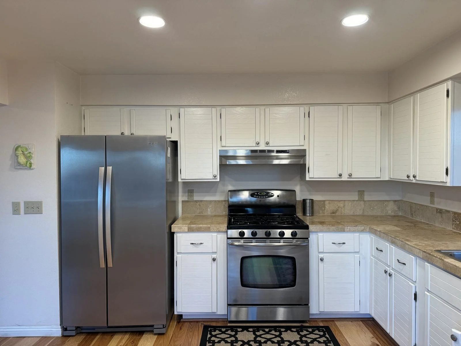 Kitchen before remodel — original cabinets and countertops, Reno NV