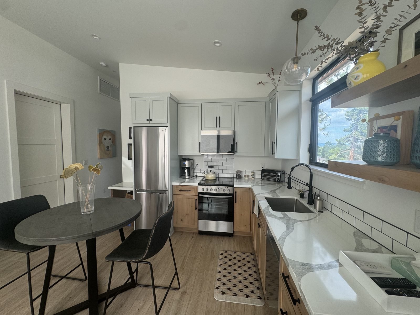 Custom light wood kitchen cabinetry with quartz countertops Reno Tahoe